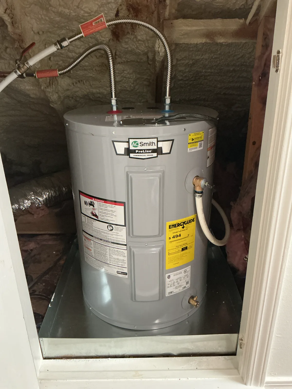 Newly installed water heater with insulated supply lines
